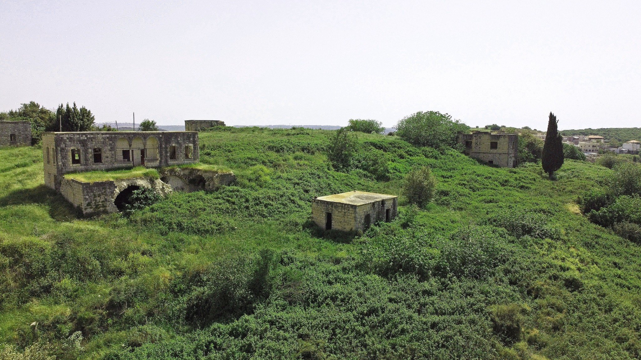 The home of Abdil Majid Abdullah and surrounding landscape in Dayr al-Qasi